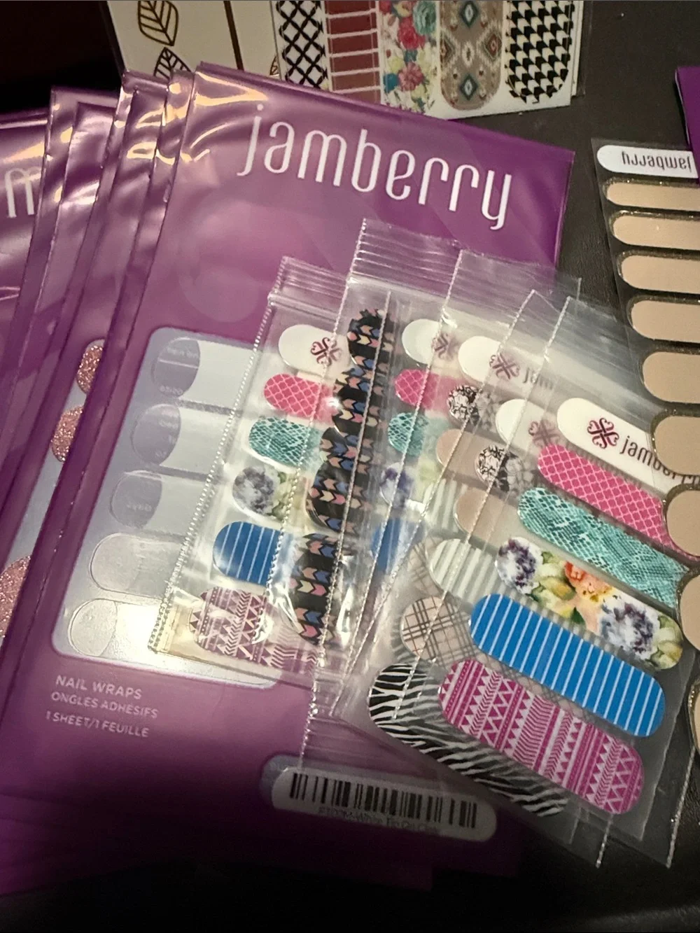 Jamberry Nail Wraps Assorted Styles in Purple Packaging